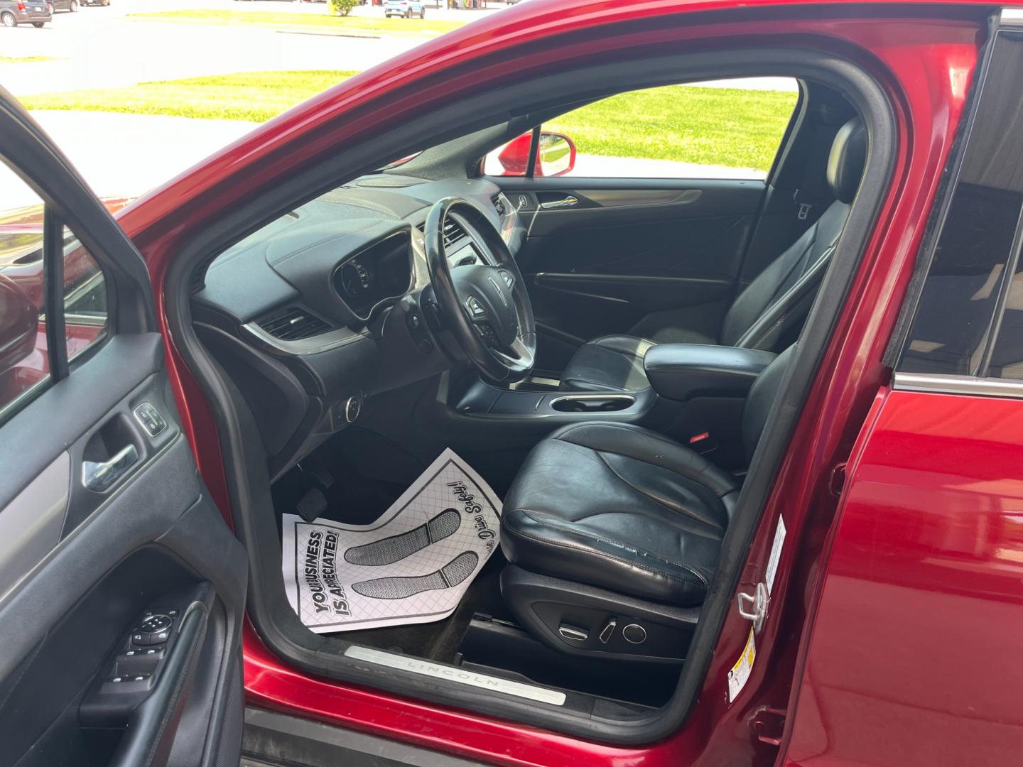 2015 Ruby Red Met Tinted CC Lincoln MKC AWD (5LMCJ2A92FU) with an 2.0L L4 DOHC 16V engine, 6-Speed Automatic transmission, located at 1633 W Kimberly, Davenport, IA, 52806, (563) 323-5341, 41.559456, -90.598732 - Photo#8